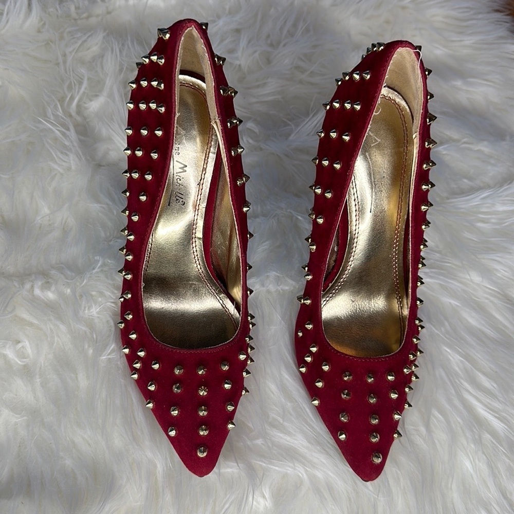 Red velvet studded heels.